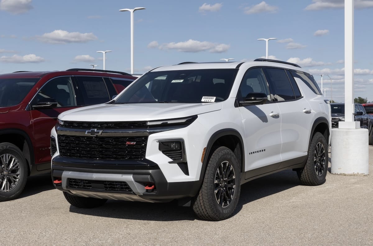 White Chevrolet Traverse SUV parked on a dealership lot