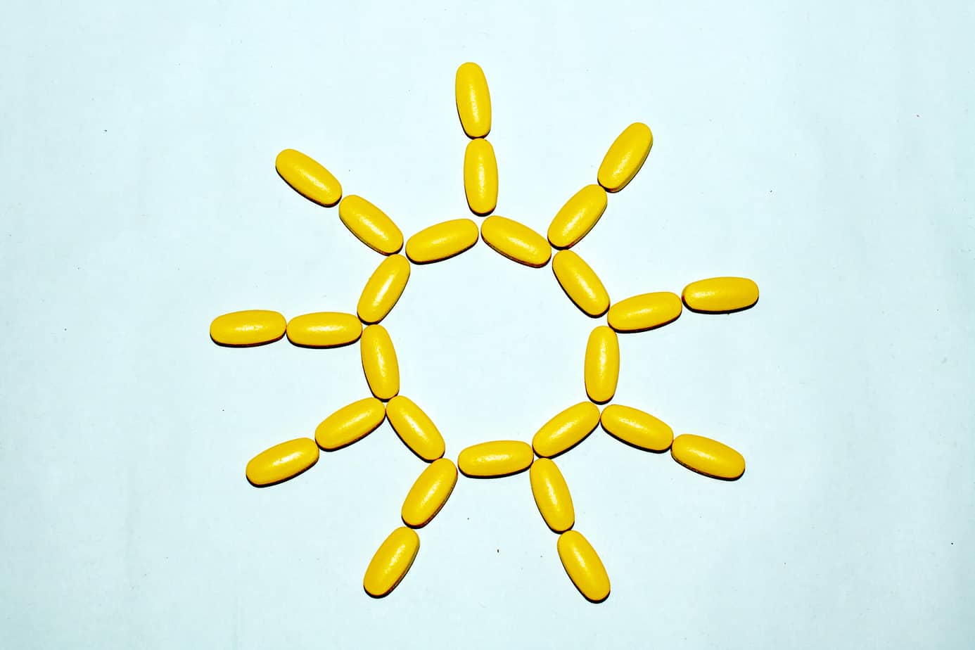 Tablets and capsules are lined in the form of the sun.