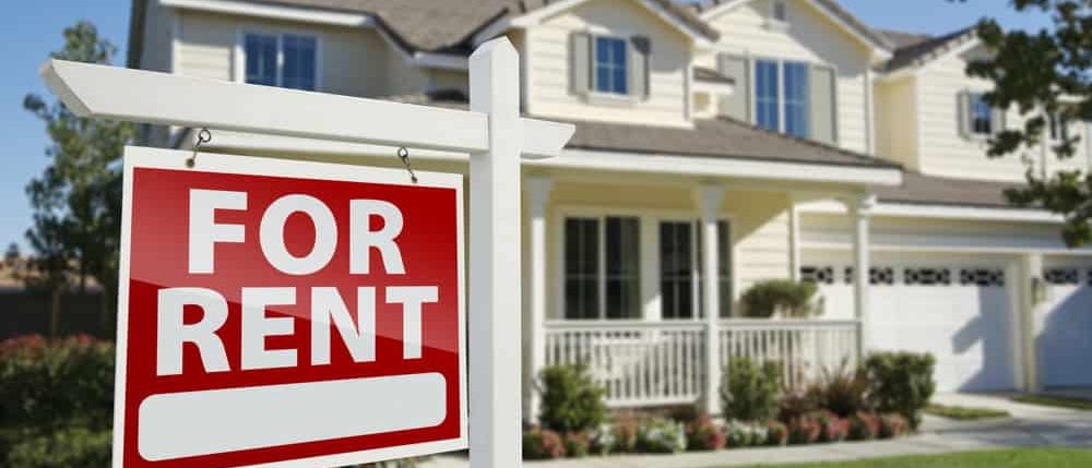 For Rent sign in front of a house
