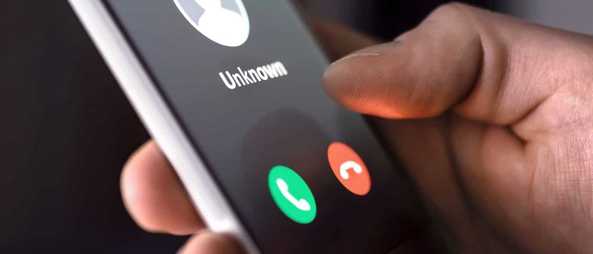 Smartphone showing an incoming call from an unknown number